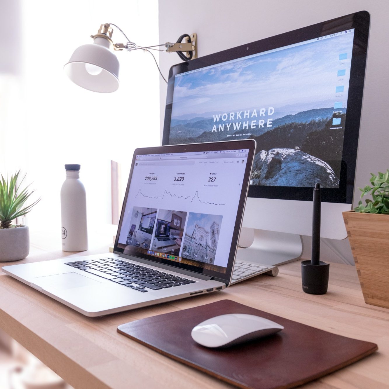 Two screens on a desk